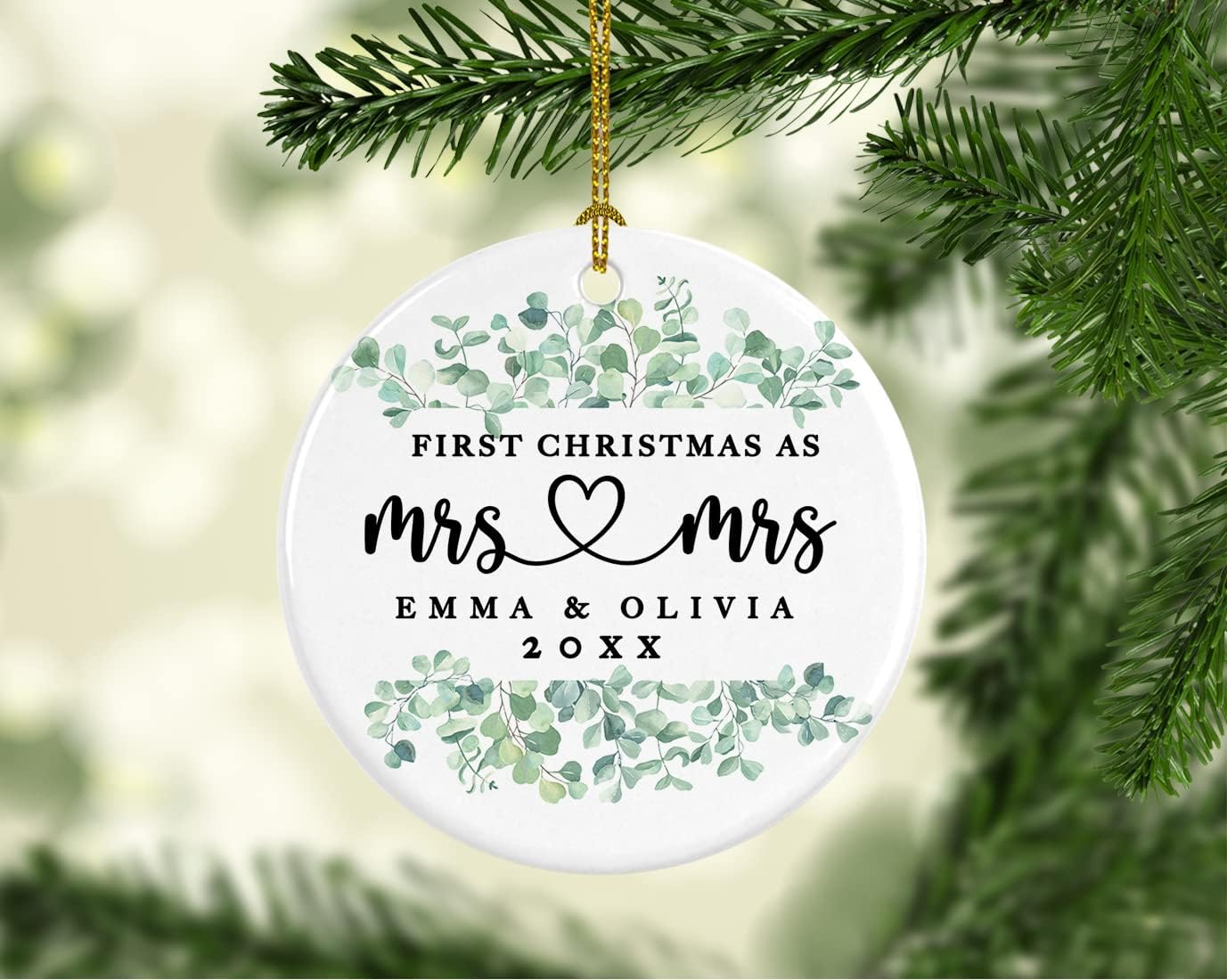 Andaz Press Personalized Our First Christmas As Mrs. & Mrs. 2025 Christmas Ornaments Greenery Eucalyptus 2.8" Round Porcelain Ceramic Lesbian Married Couple Gay Women Newlyweds Keepsake 1-Pack